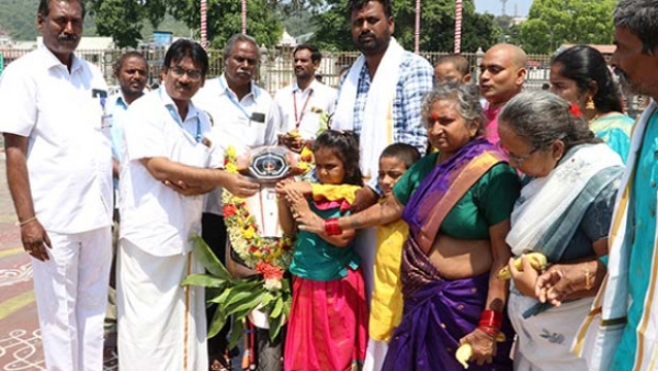 /two-wheeler-donated-to-ttd