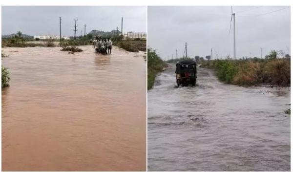 భారీ వర్షం.. నేషనల్ హైవేపై కిలోమీటర్ల మేర నిలిచిన వాహనాలు భారీ వర్షం.. నేషనల్ హైవేపై కిలోమీటర్ల మేర నిలిచిన వాహనాలు